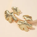 Aretes Dorados Dos Hojas