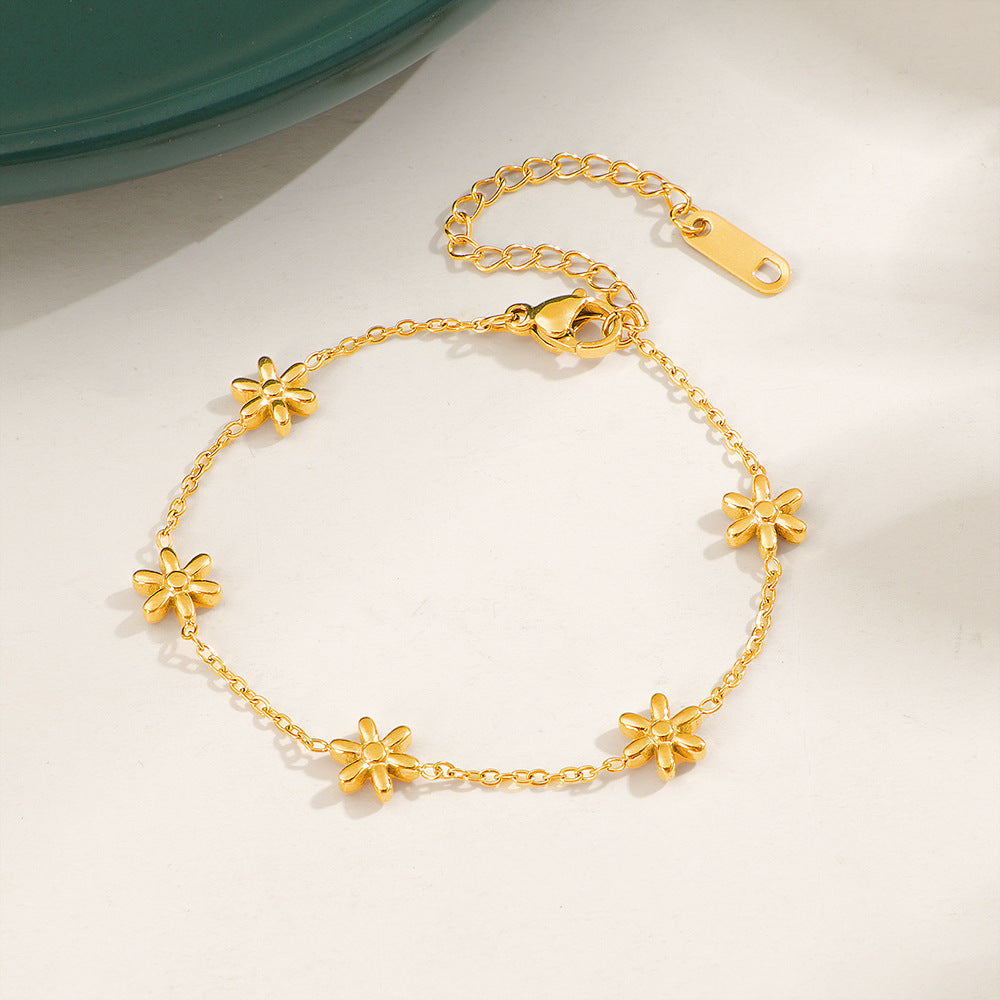 Pulsera dorada flores doradas pequeñas