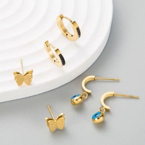 Set de 3 Aretes Mariposa, Argollas y Ojo turco